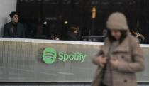 NEW YORK, NEW YORK - JANUARY 23: People are seen inside the Spotify headquarters building in Lower Manhattan on January 23, 2023 in New York City. Spotify announced Monday they will be cutting 6% of its global workforce. (Photo by Eduardo MunozAlvarez/VIEWpress via Getty Images)