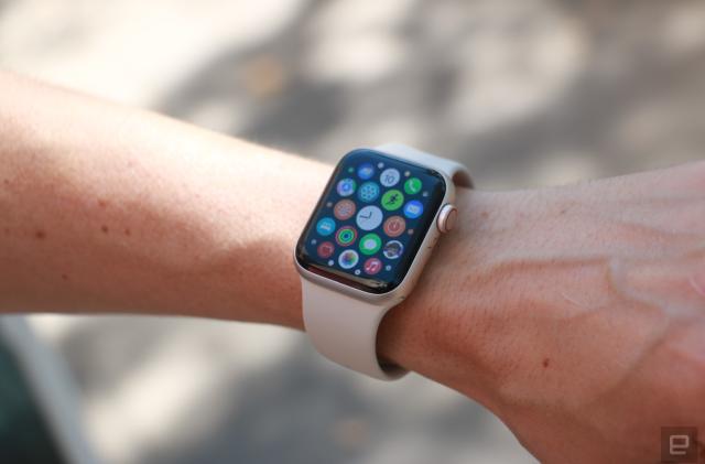 The Apple Watch SE (2022) on a person's wrist, showing the apps gallery.
