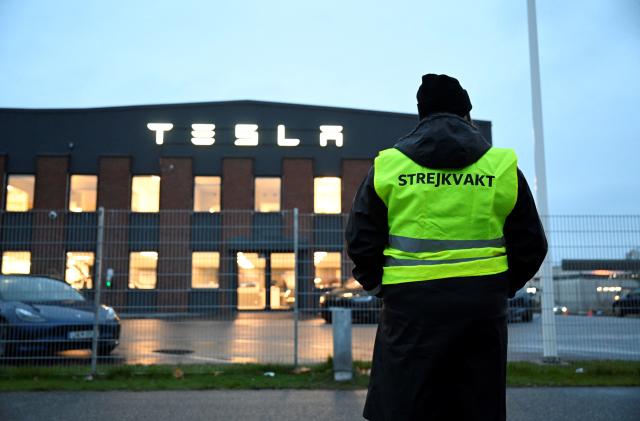 Emma Hansson, chairman of IF Metall Stockholms län stands in front of the electric car company Tesla's Service Center in Segeltorp, south of Stockholm, as workers strike for the signing of a collective agreement on October 27, 2023. (Photo by Jessica Gow/TT / TT NEWS AGENCY / AFP) / Sweden OUT (Photo by JESSICA GOW/TT/TT NEWS AGENCY/AFP via Getty Images)