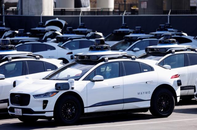 A view shows some of a small fleet of Jaguar I-Pace electric vehicles at Waymo's operations center in the Bayview district of San Francisco, California, U.S. October 19, 2021. Picture taken October 19, 2021.  REUTERS/Peter DaSilva