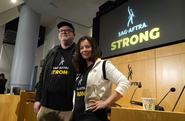 SAG-AFTRA president Fran Drescher, right, and SAG-AFTRA National Executive Director and Chief Negotiator Duncan Crabtree-Ireland appear following a press conference announcing a strike by The Screen Actors Guild-American Federation of Television and Radio Artists on Thursday, July, 13, 2023, in Los Angeles. This marks the first time since 1960 that actors and writers will picket film and television productions at the same time. (AP Photo/Chris Pizzello)