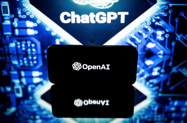 This file photo taken on January 23, 2023 in Toulouse, southwestern France, shows screens displaying the logos of OpenAI and ChatGPT.