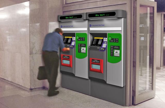 An MTA MetroCard vending machine in use at a train station. One man is using one of the two machines there.